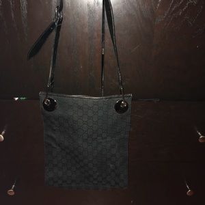 Gucci crossbody purse.